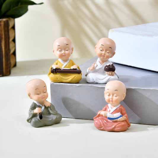 TIED RIBBONS Set of 4 Buddha Monk Statue Figurines